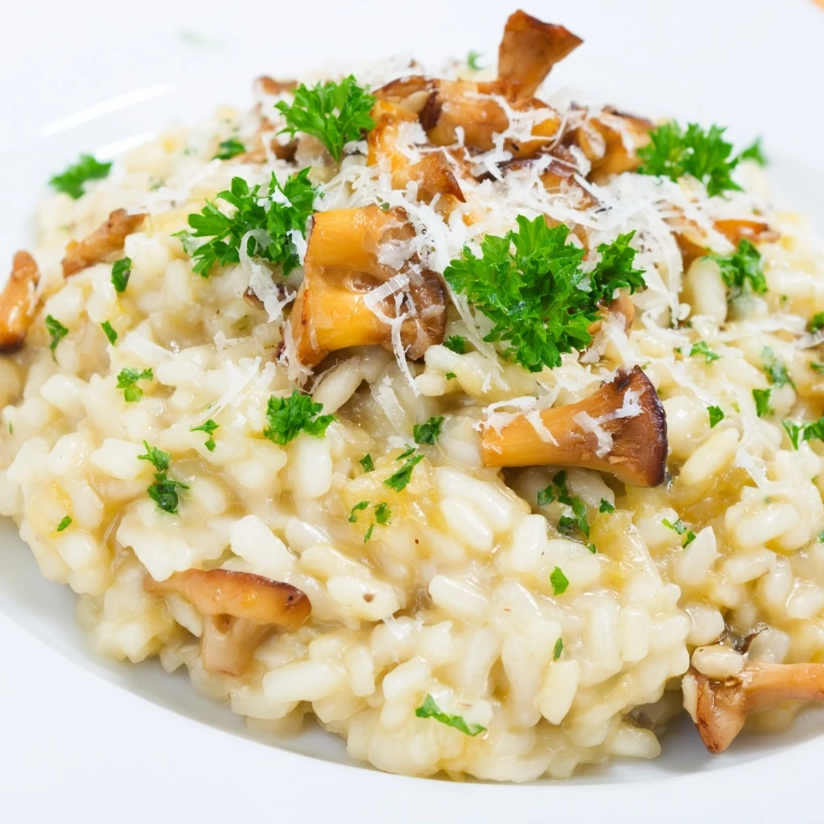 A steaming bowl of creamy mushroom risotto, garnished with fresh parsley and Parmesan.