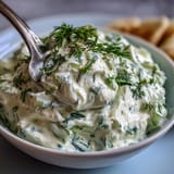 Creamy Skyr Tzatziki Dip with crisp cucumber and fresh dill, a refreshing appetizer dip.