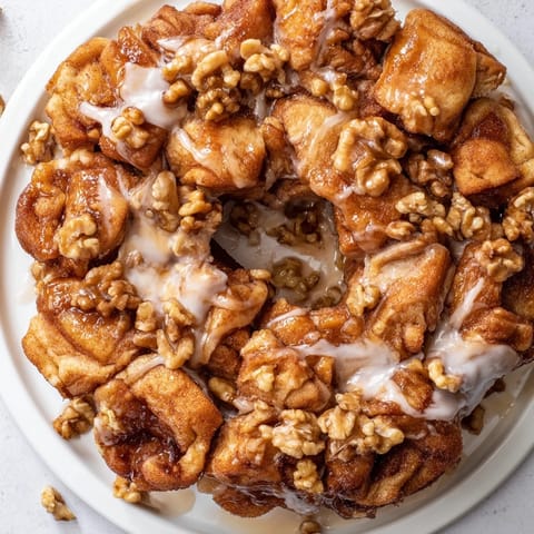 Gooey, golden-brown Cinnamon Roll Monkey Bread, ready to be pulled apart and enjoyed.