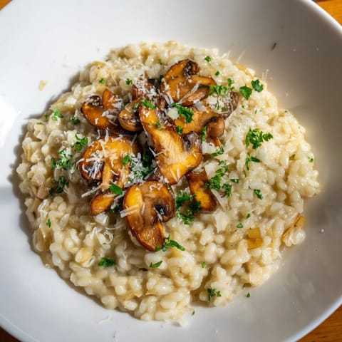 The rich, creamy texture of this homemade mushroom risotto is enhanced by Parmesan.