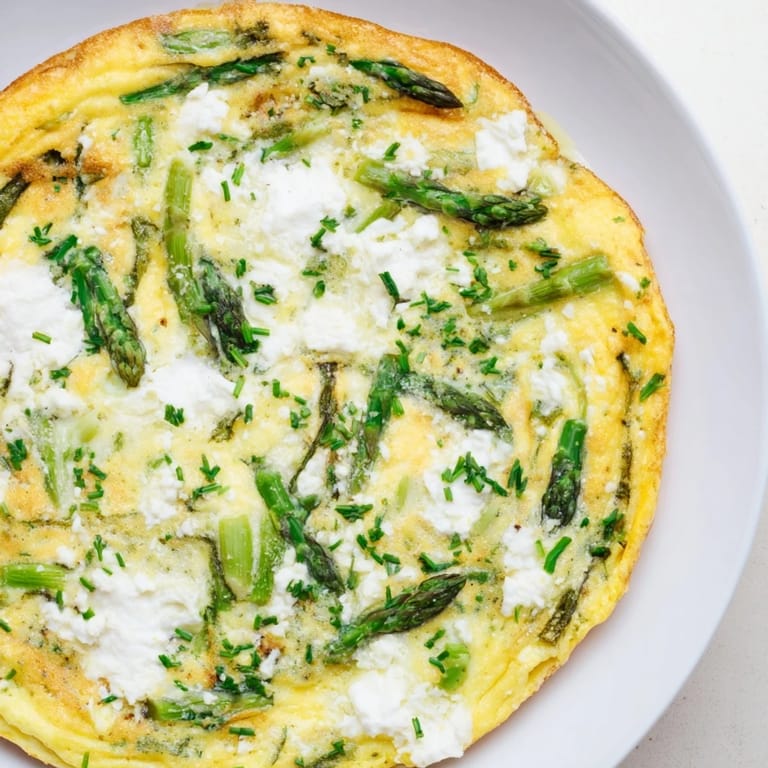 A warm, creamy Meadow-Soft Cozy Plate Frittata ready to be served, a perfect vegetarian meal.