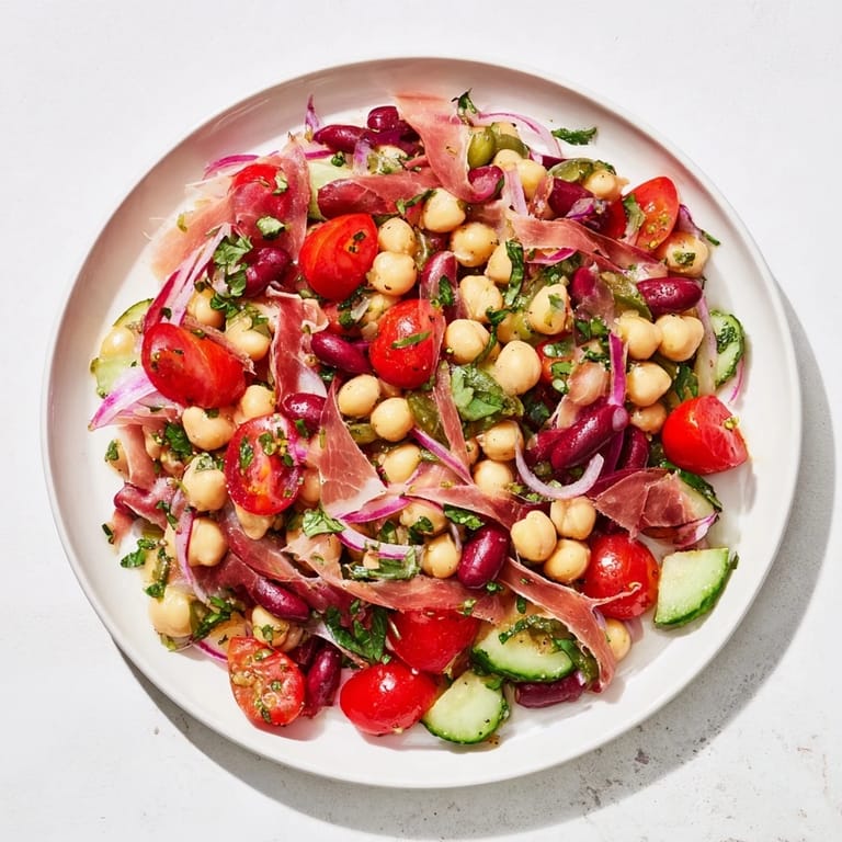 Chilled Dense Bean Salad with Prosciutto, a hearty side or main course, ready to serve and enjoy.